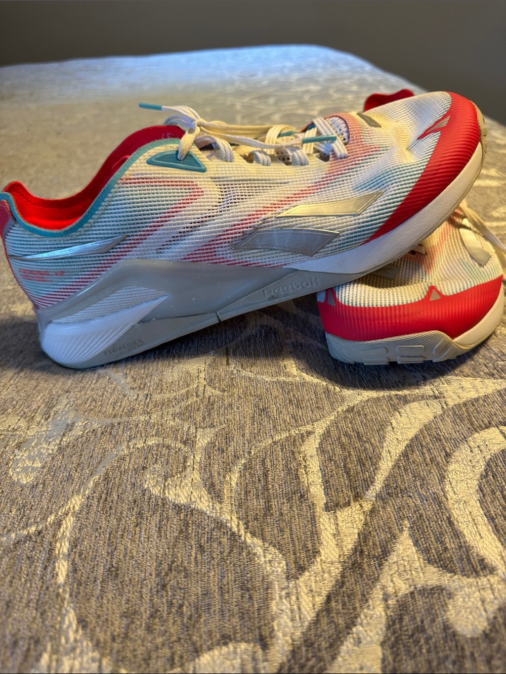 Reebok Nano Froning X2 Men’s White Athletic Sneakers with Red and Blue Accents